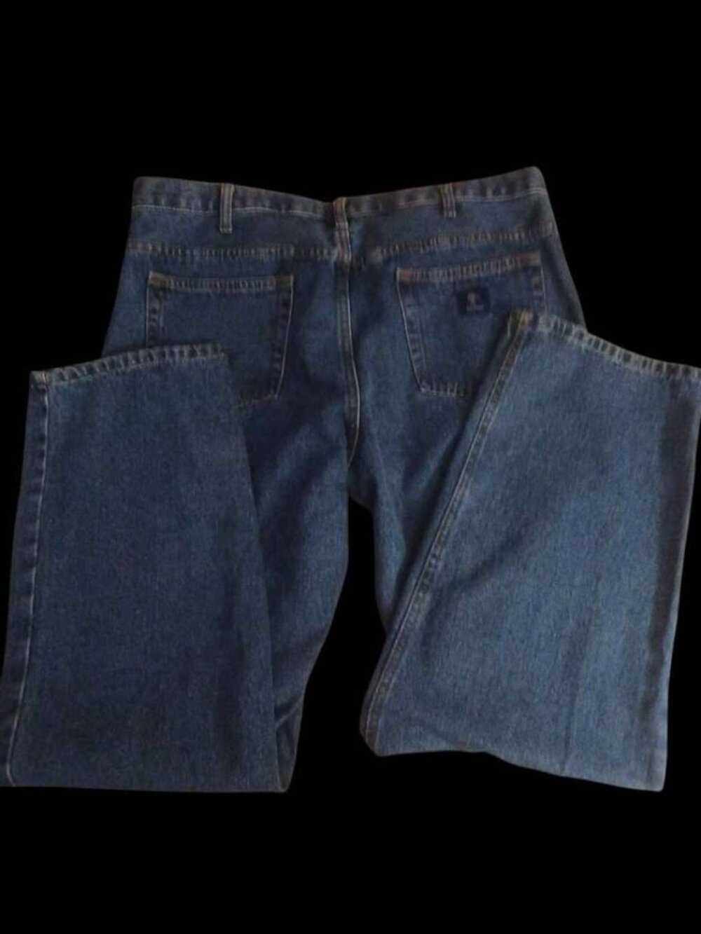 Blue Denim blue denim jeans. Has traditional five-pocket style. Zip - Picture 2 of 2